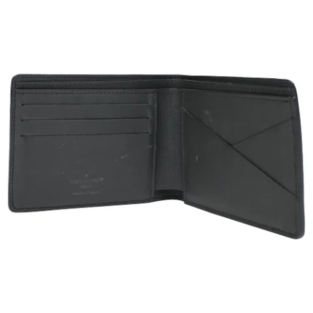 Louis Vuitton Vintage Pre-owned Leather wallets Black Heren