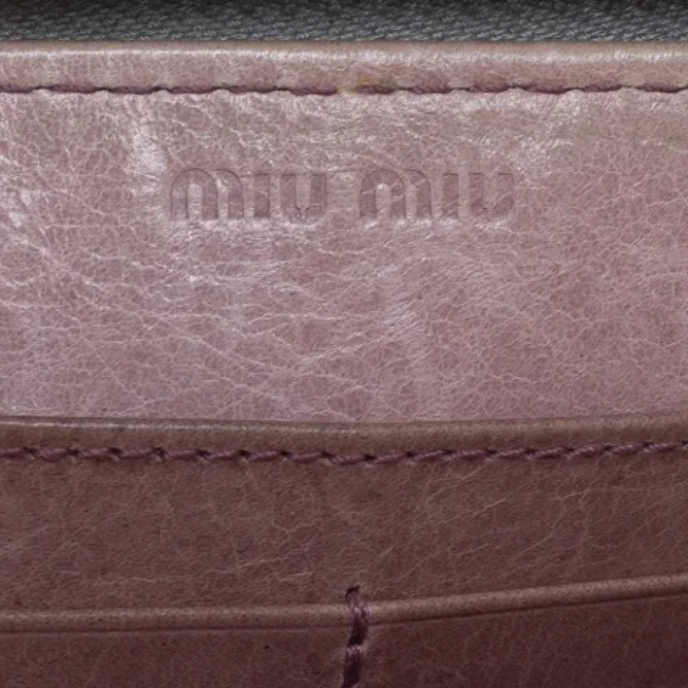 Miu Pre-owned Leather wallets Gray Dames