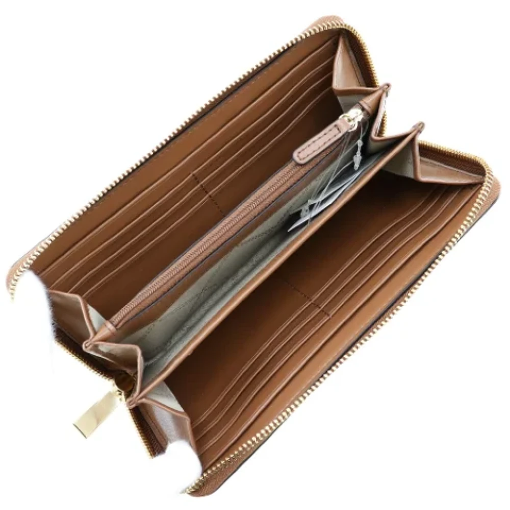 Michael Kors Pre-owned Leather wallets Brown Dames