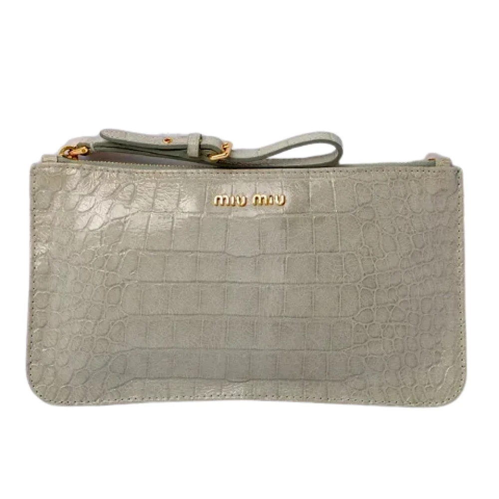 Miu Pre-owned Leather clutches Green Dames