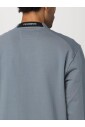 zwarte-sweatshirt-met-goggle-lens-detail