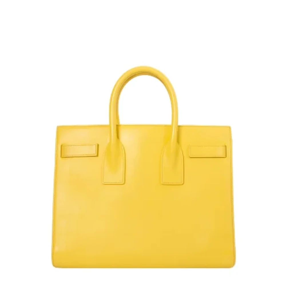 Yves Saint Laurent Vintage Pre-owned Leather handbags Yellow Dames