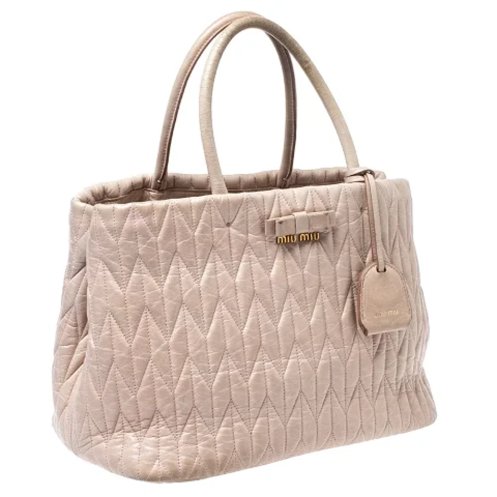 Miu Pre-owned Leather totes Beige Dames