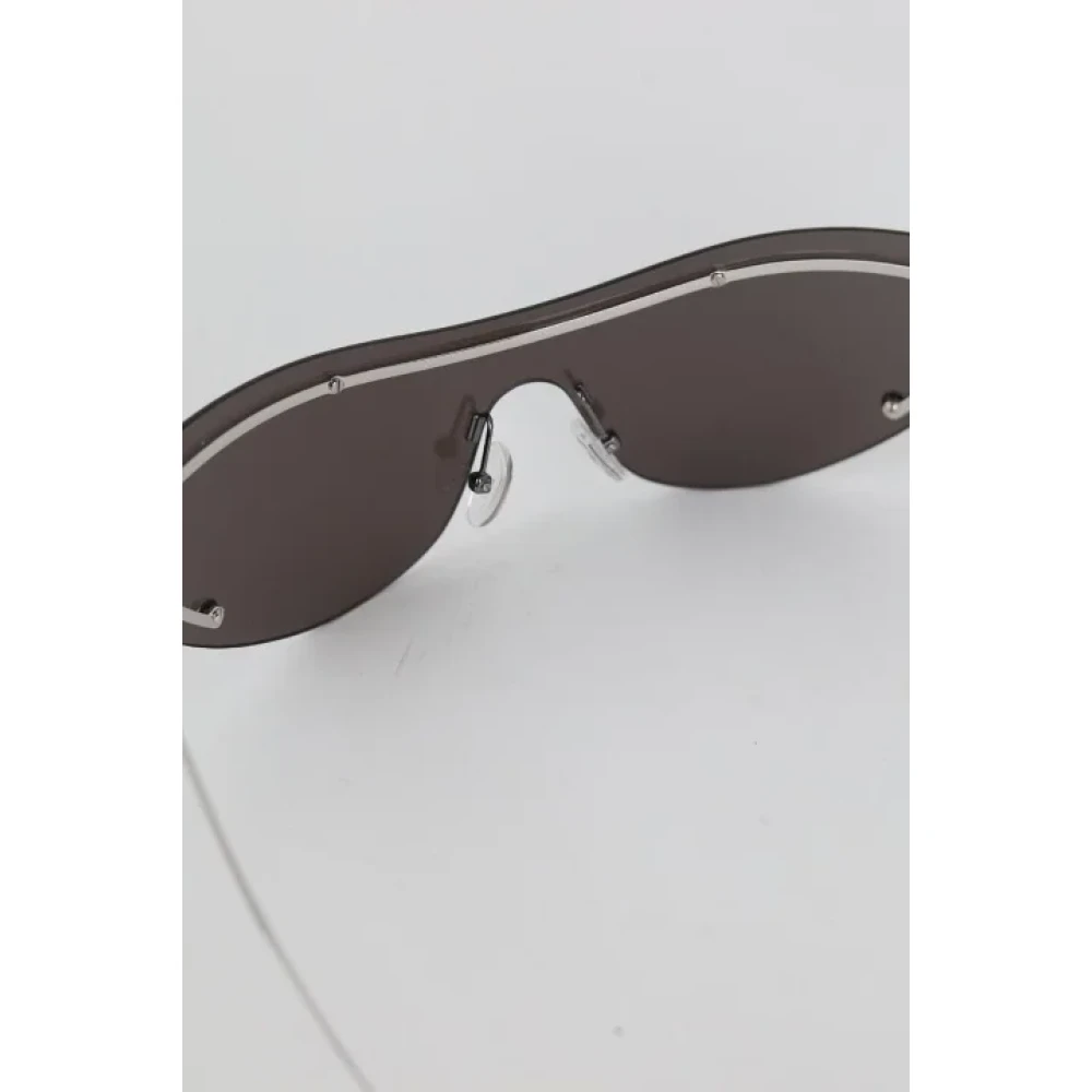 Alexander McQueen Pre-owned Metal sunglasses Black Dames