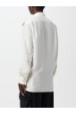 blouse-en-soie-blanche-avec-epaulettes