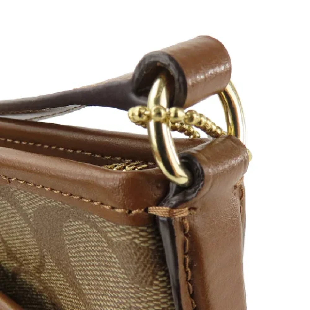 Coach Pre-owned Plastic shoulder-bags Brown Dames