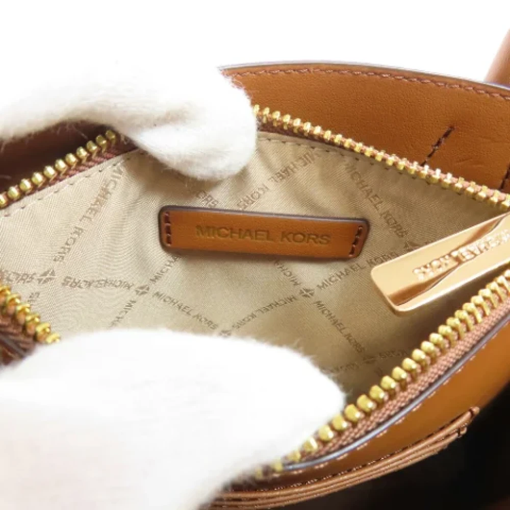 Michael Kors Pre-owned Plastic handbags Brown Dames