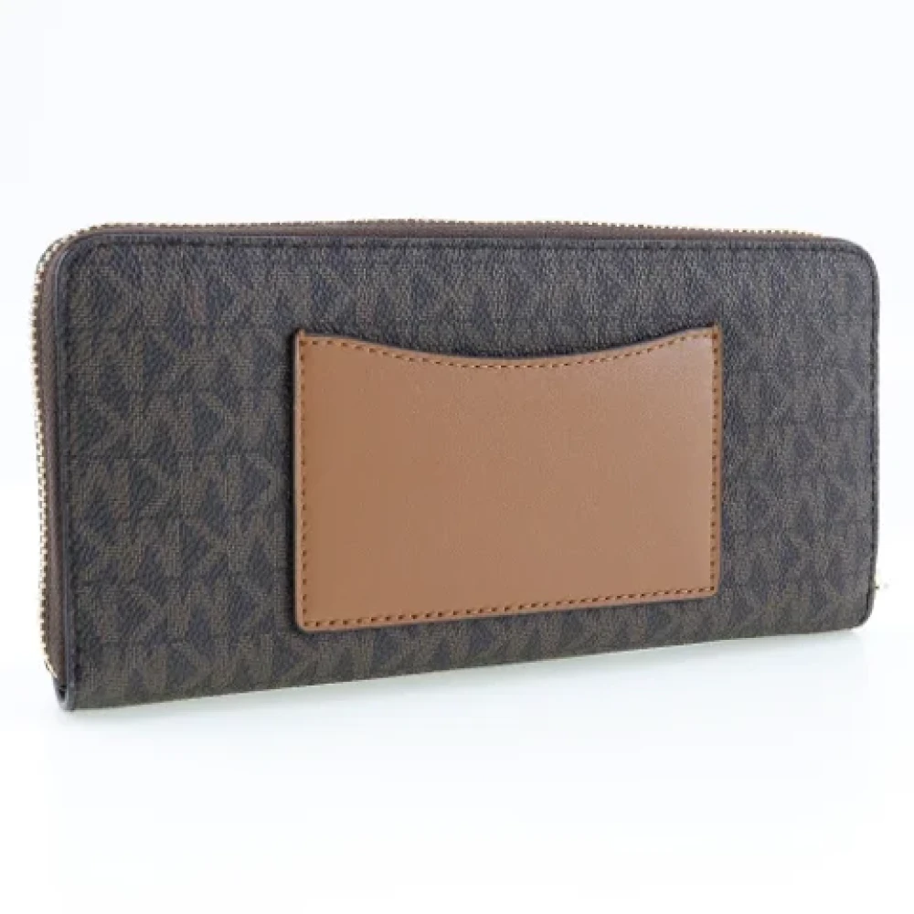 Michael Kors Pre-owned Leather wallets Brown Dames