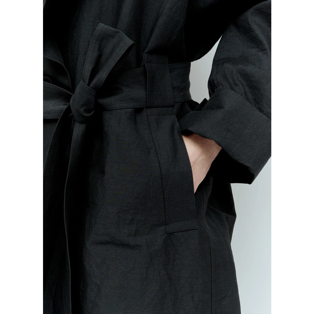 Issey Miyake Coats Black Dames