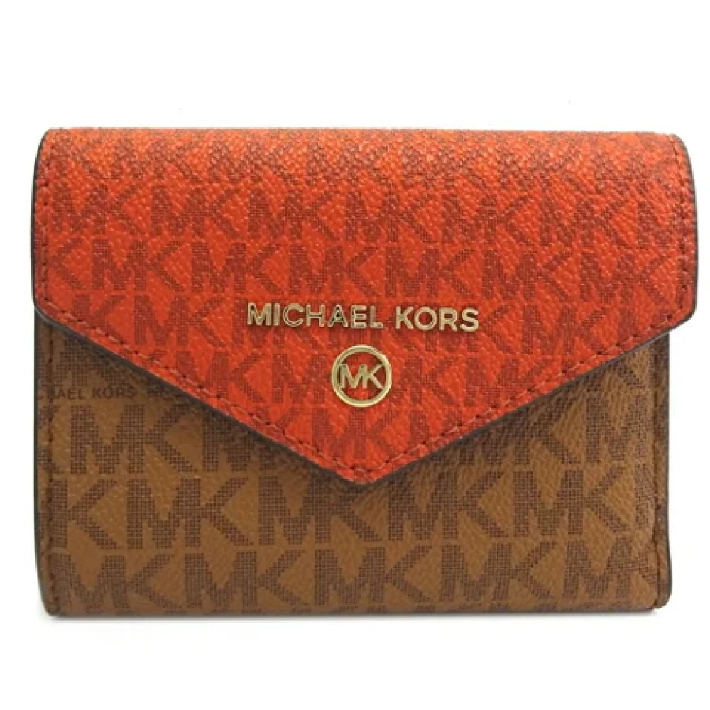 Michael Kors Pre-owned Canvas wallets Brown Dames