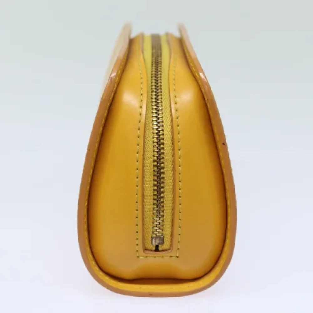 Louis Vuitton Vintage Pre-owned Leather pouches Yellow Dames