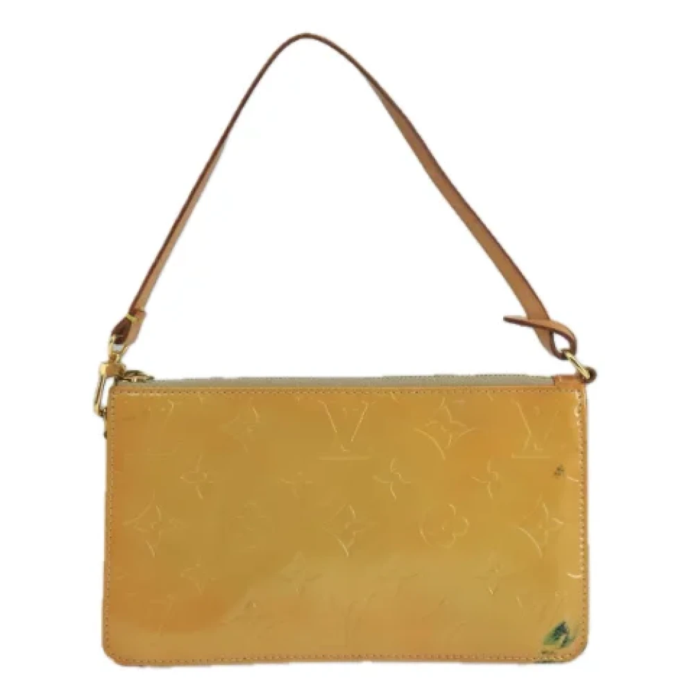 Louis Vuitton Vintage Pre-owned Leather pouches Beige Dames