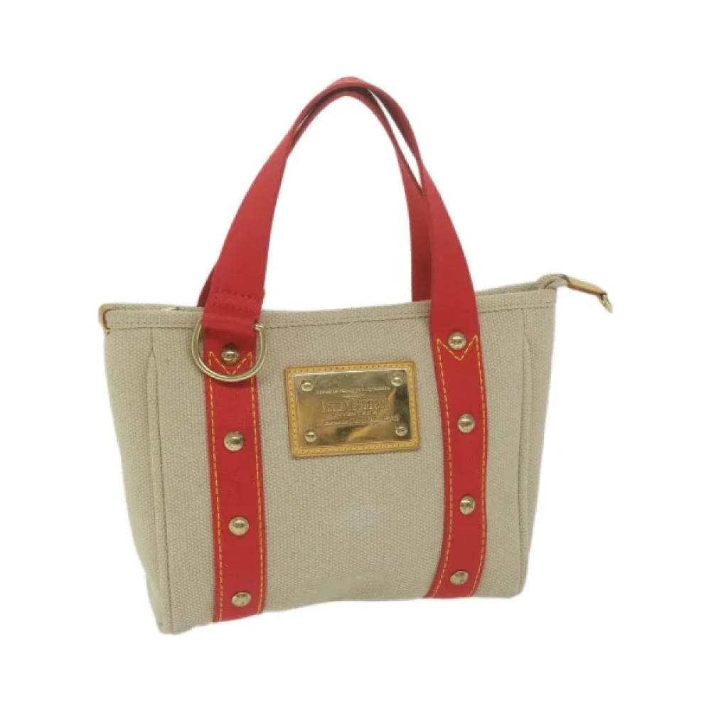 Louis Vuitton Vintage Pre-owned Cotton handbags Beige Dames