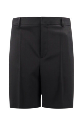 black-wool-trousers-button-closure