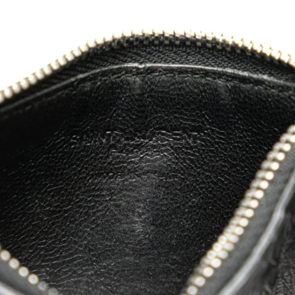 Yves Saint Laurent Vintage Pre-owned Leather wallets Black Dames