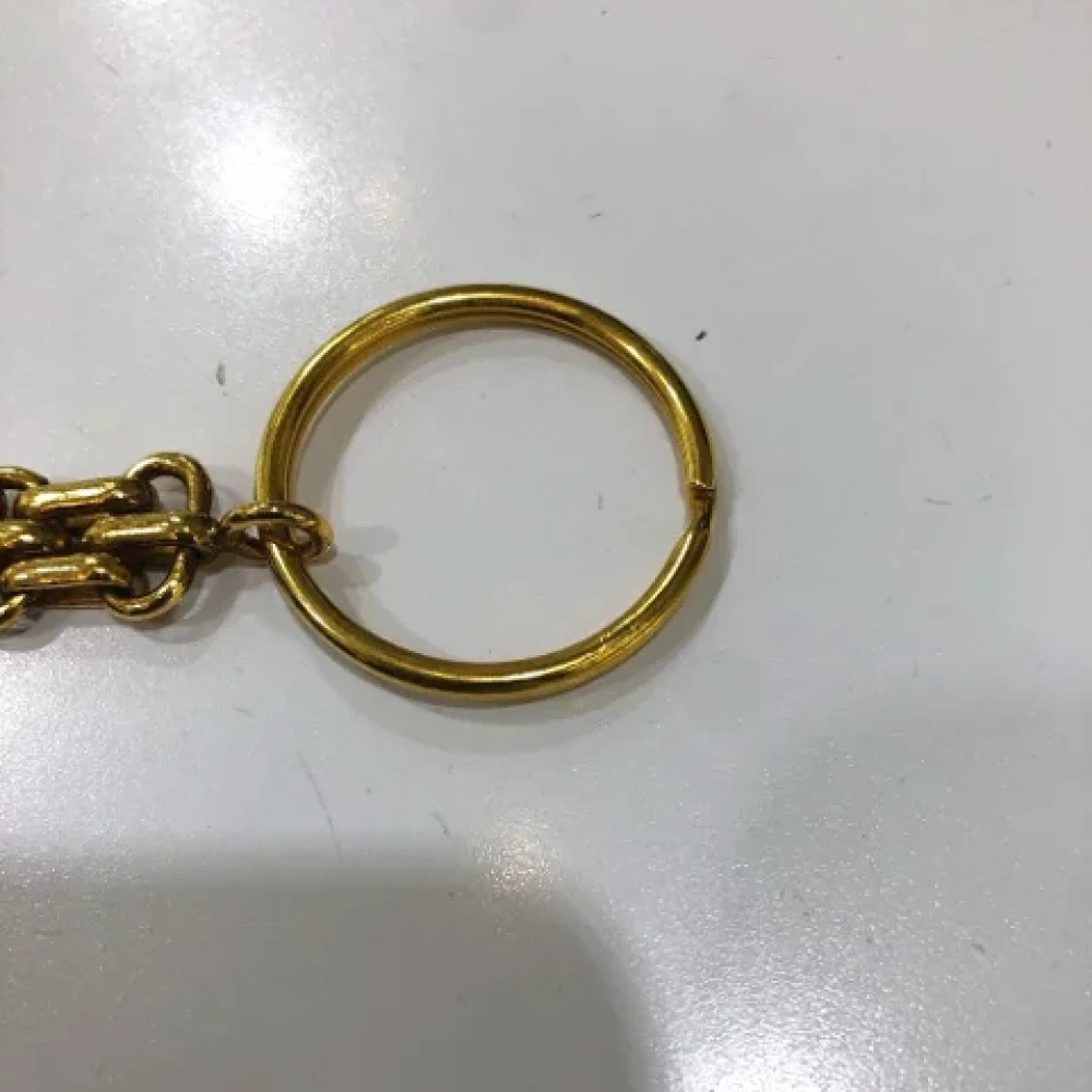 Chanel Vintage Pre-owned Metal key-holders Yellow Dames