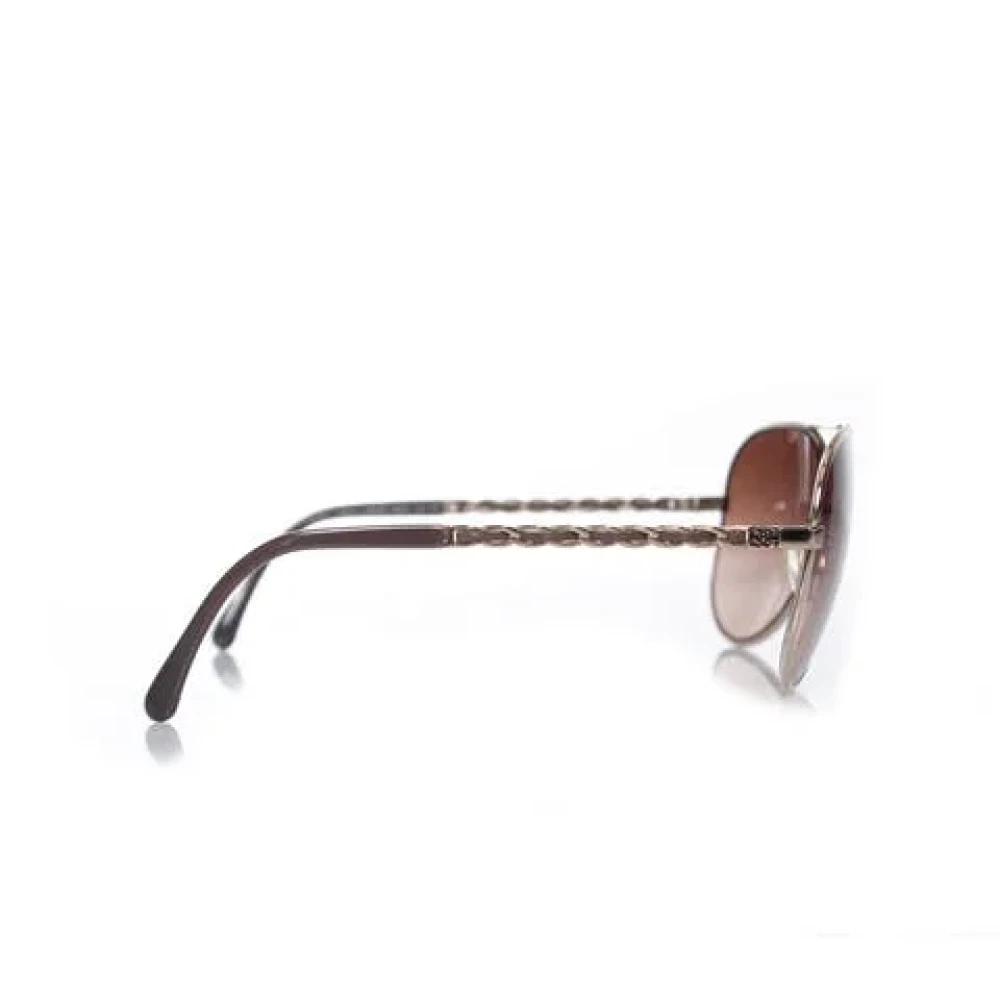 Chanel Vintage Pre-owned Metal sunglasses Brown Heren