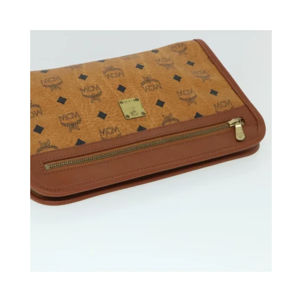 MCM Pre-owned Leather clutches Brown Dames