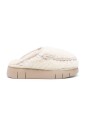 white-shearling-mules
