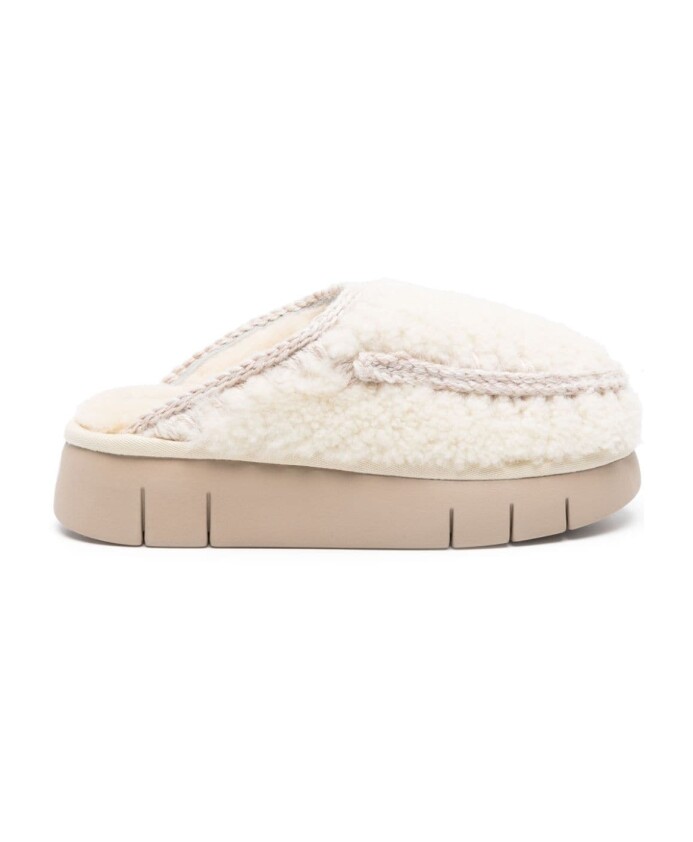 white-shearling-mules