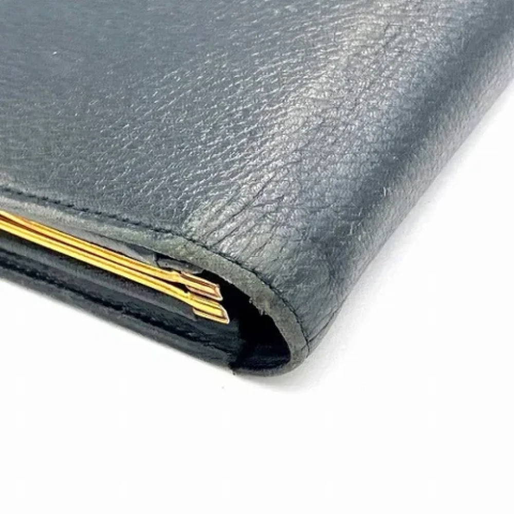 Yves Saint Laurent Vintage Pre-owned Leather wallets Black Dames