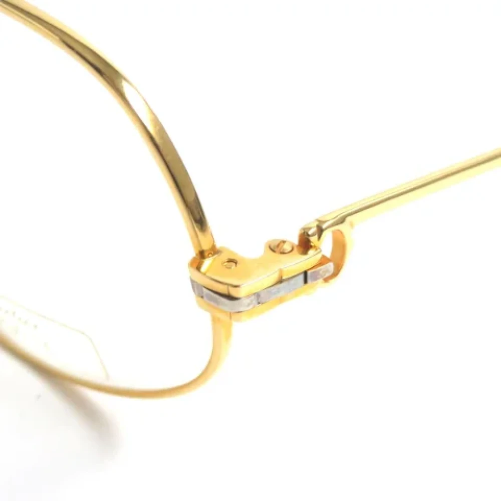 Cartier Vintage Pre-owned Metal sunglasses Yellow Dames