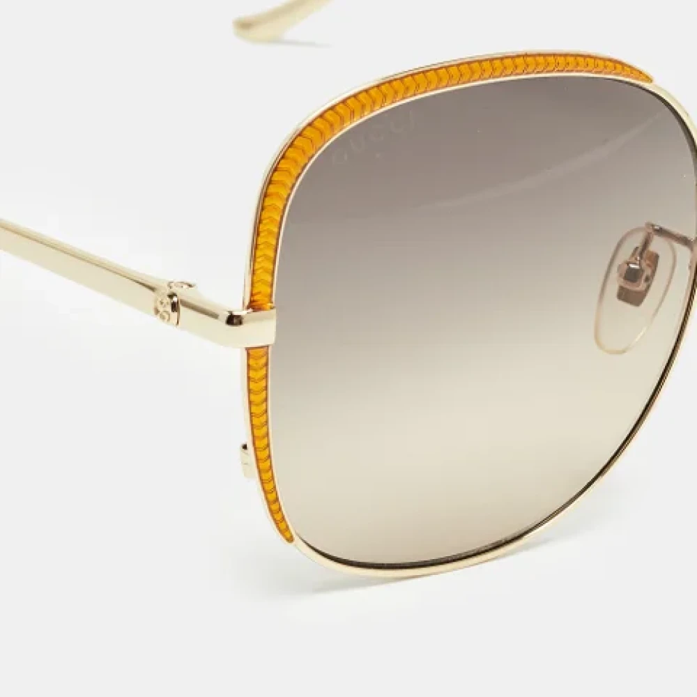 Gucci Vintage Pre-owned Metal sunglasses Yellow Dames
