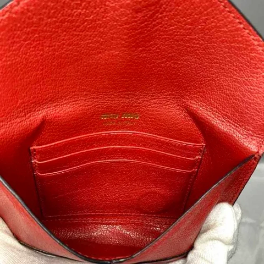 Miu Pre-owned Leather wallets Red Dames