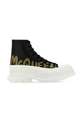 black-leather-tread-slick-sneakers