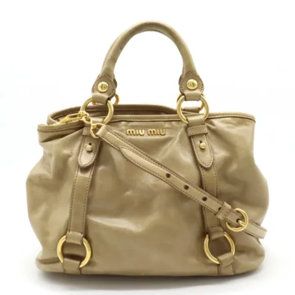 Miu Pre-owned Fabric handbags Beige Dames