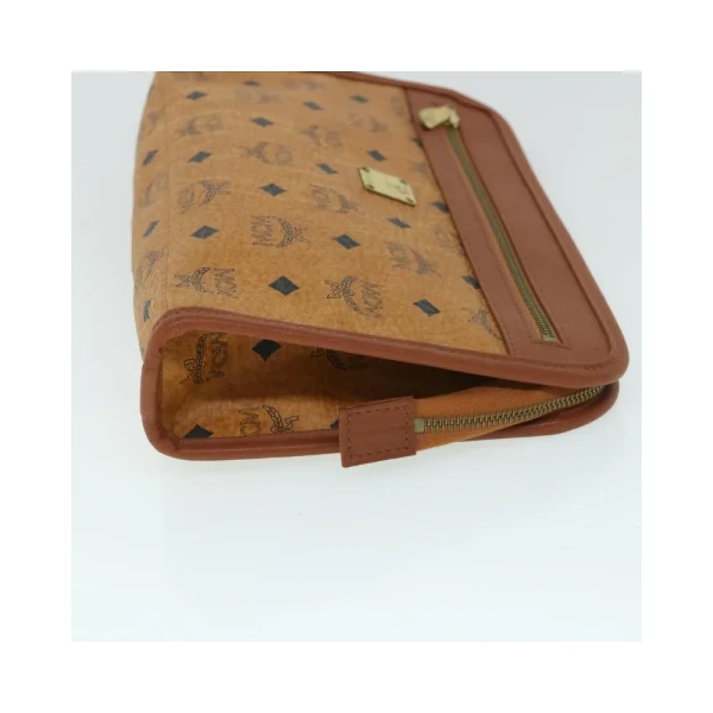 MCM Pre-owned Leather clutches Brown Dames
