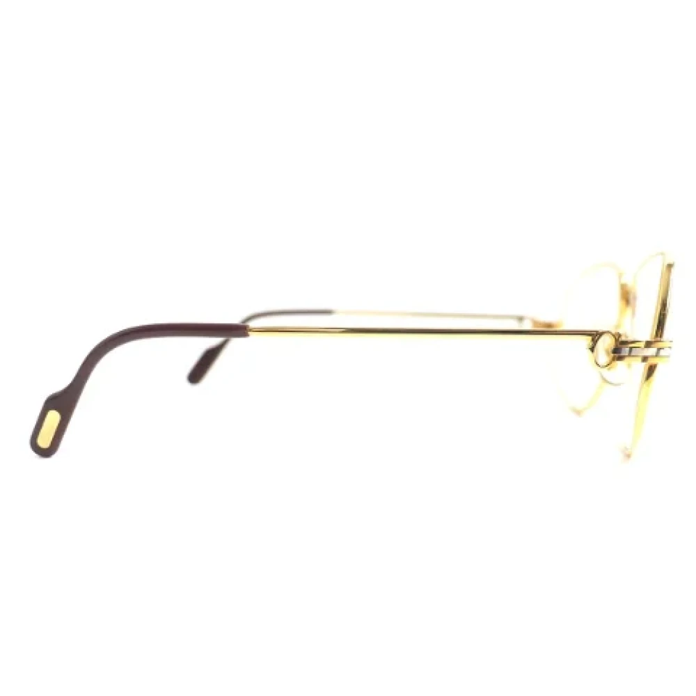 Cartier Vintage Pre-owned Metal sunglasses Yellow Dames