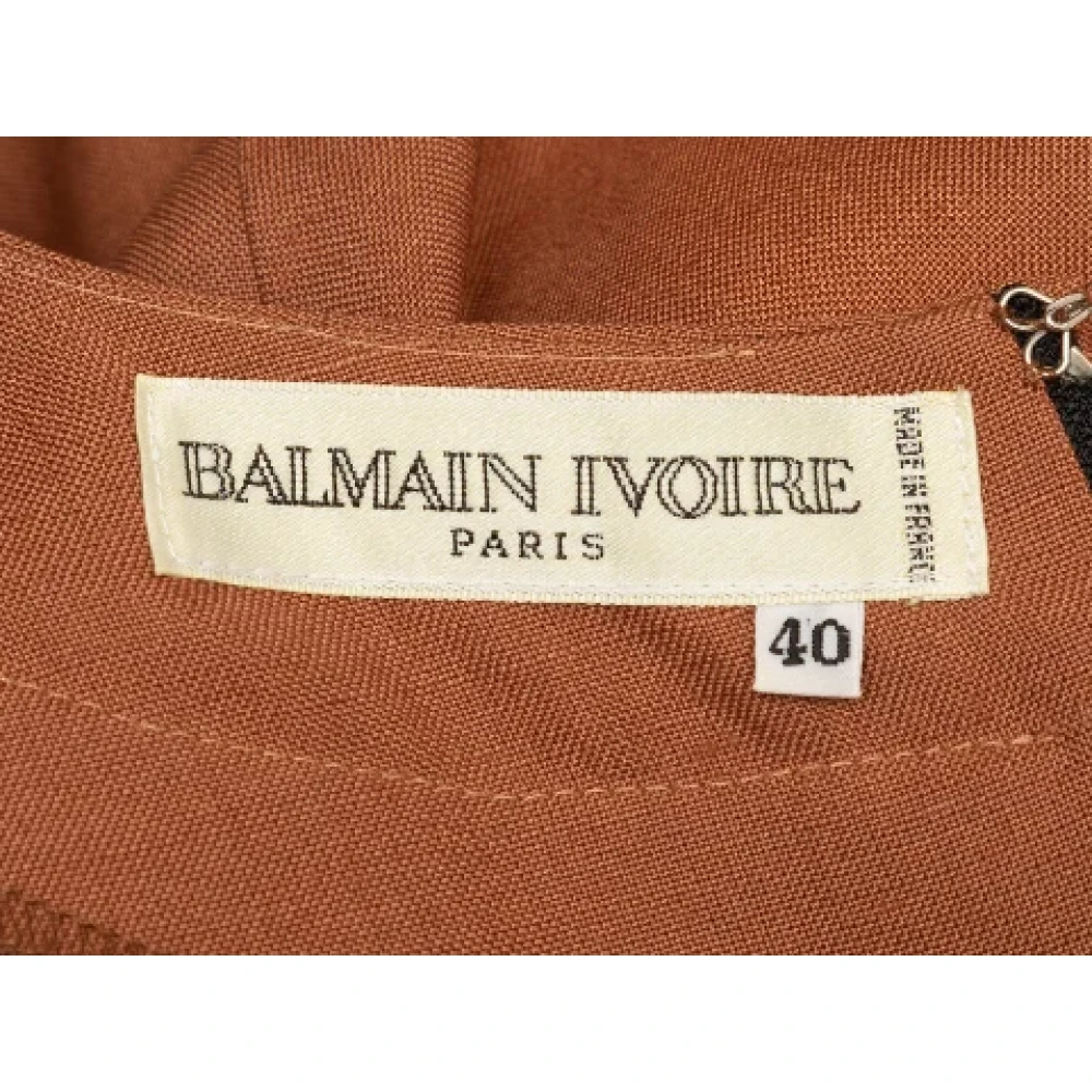 Balmain Pre-owned Fabric dresses Brown Dames