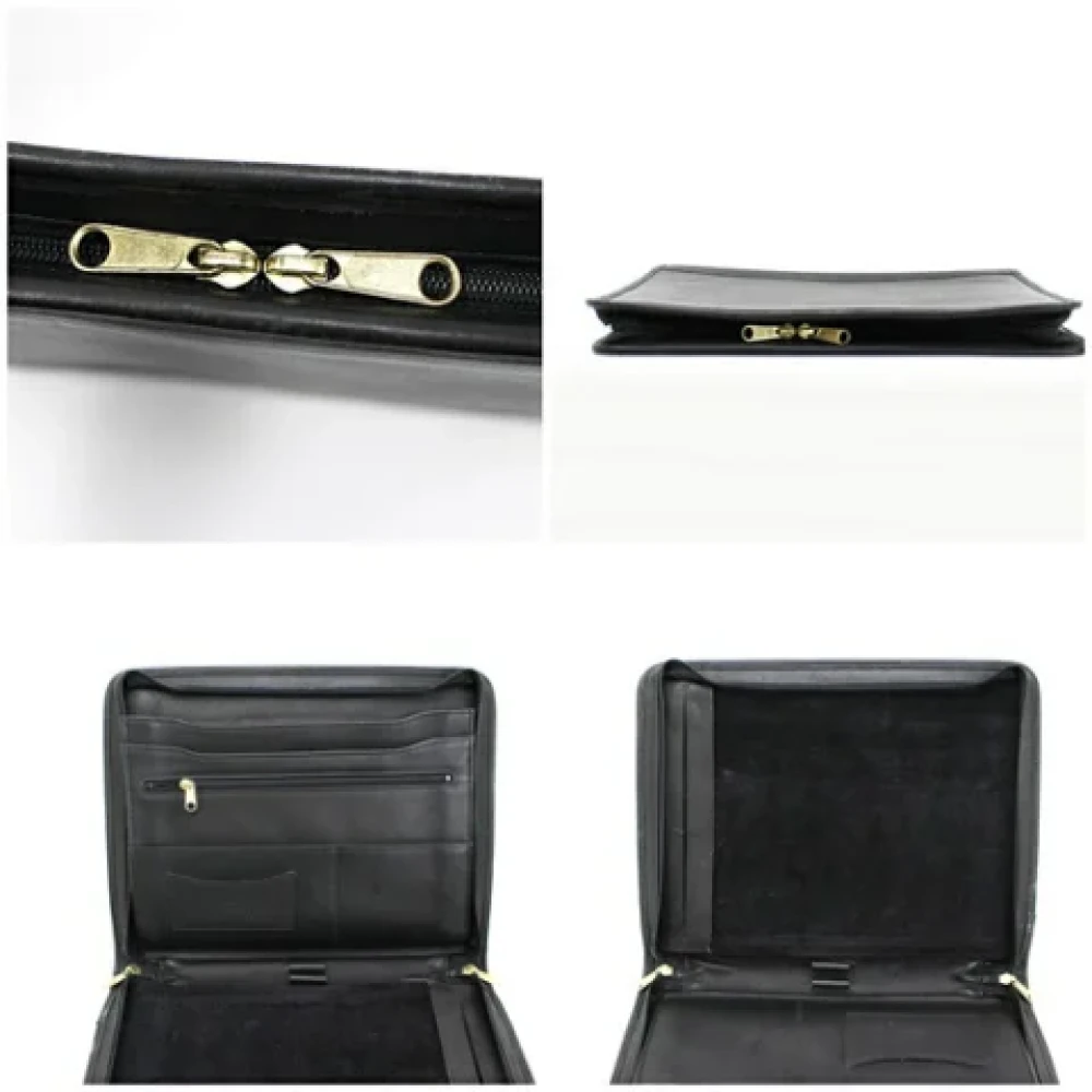 Coach Pre-owned Leather clutches Black Dames