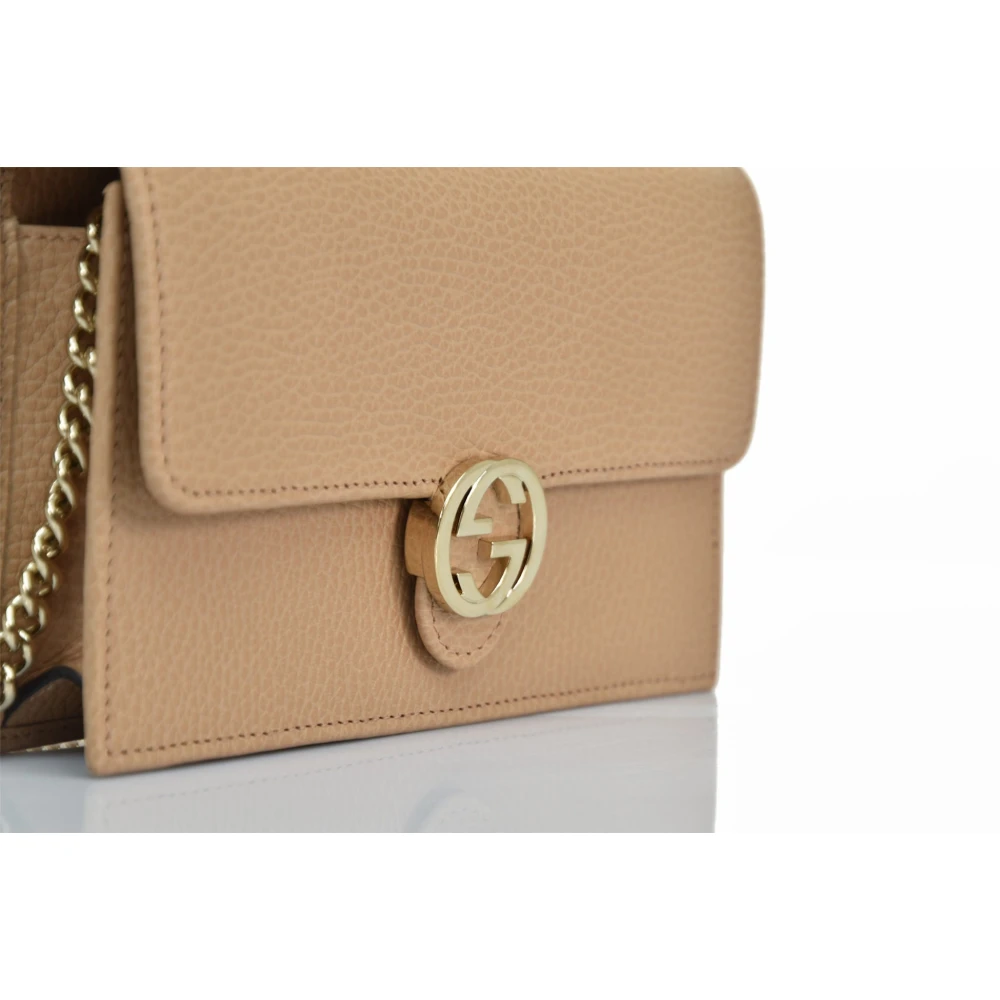 Gucci Interlocking Pebbled Leather Crossbody Tas Beige Dames