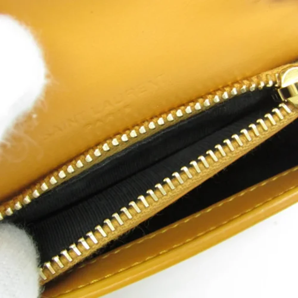 Yves Saint Laurent Vintage Pre-owned Leather wallets Orange Dames