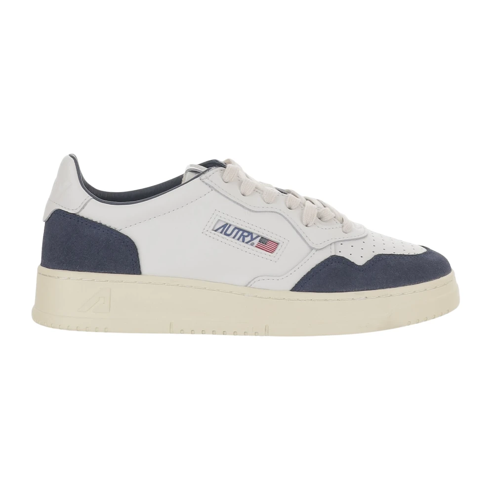 Autry Leather sneakers Round toe Front lacing Logo details Suede inserts Rubber sole Made in Indonesia Composition: 100% leather Heren Schoenen Blauw