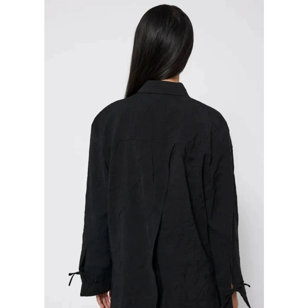 Norr Zwarte lange blouse met strikdetails Black Dames