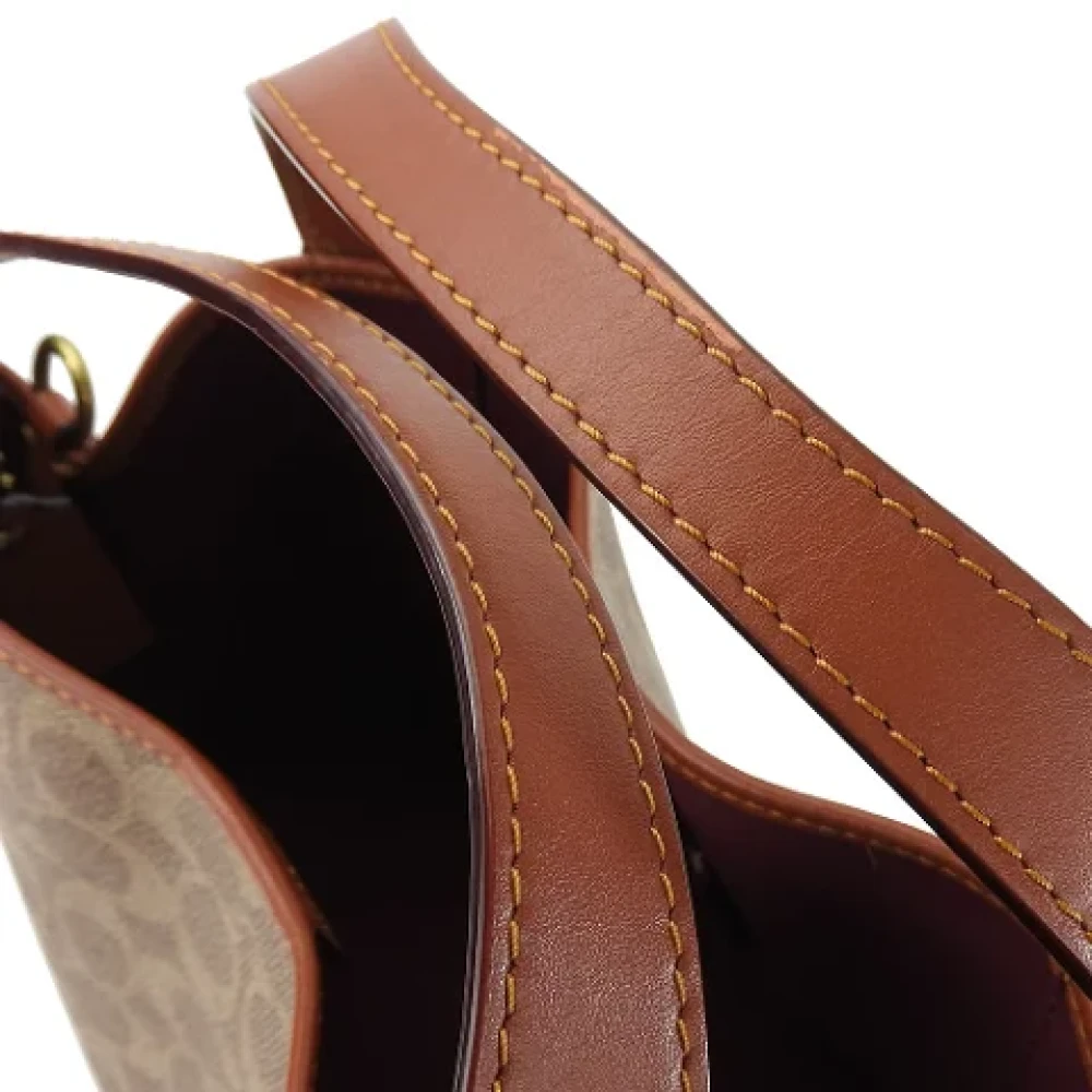 Coach Pre-owned Plastic handbags Brown Dames