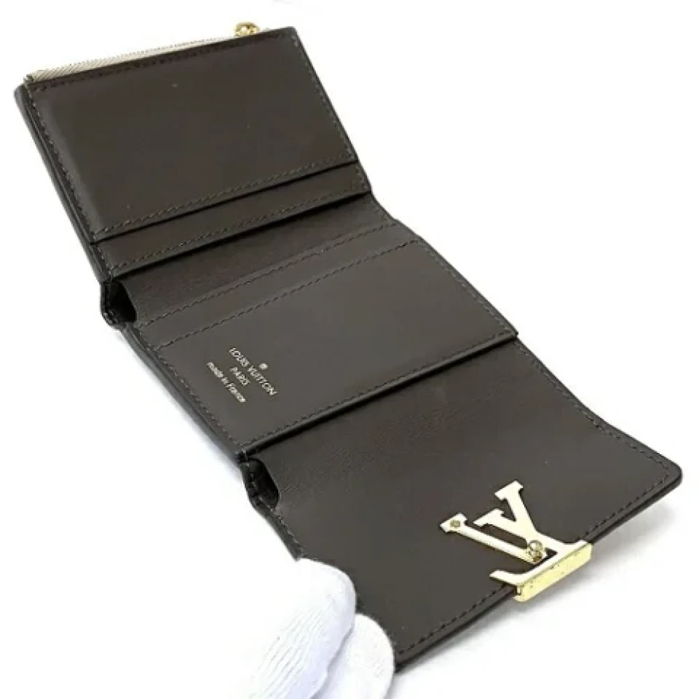 Louis Vuitton Vintage Pre-owned Leather wallets Beige Dames