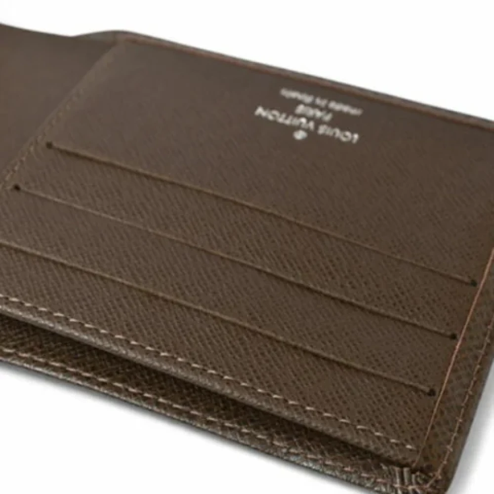 Louis Vuitton Vintage Pre-owned Leather wallets Brown Heren