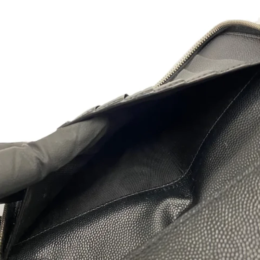 Saint Laurent Vintage Pre-owned Leather wallets Black Unisex