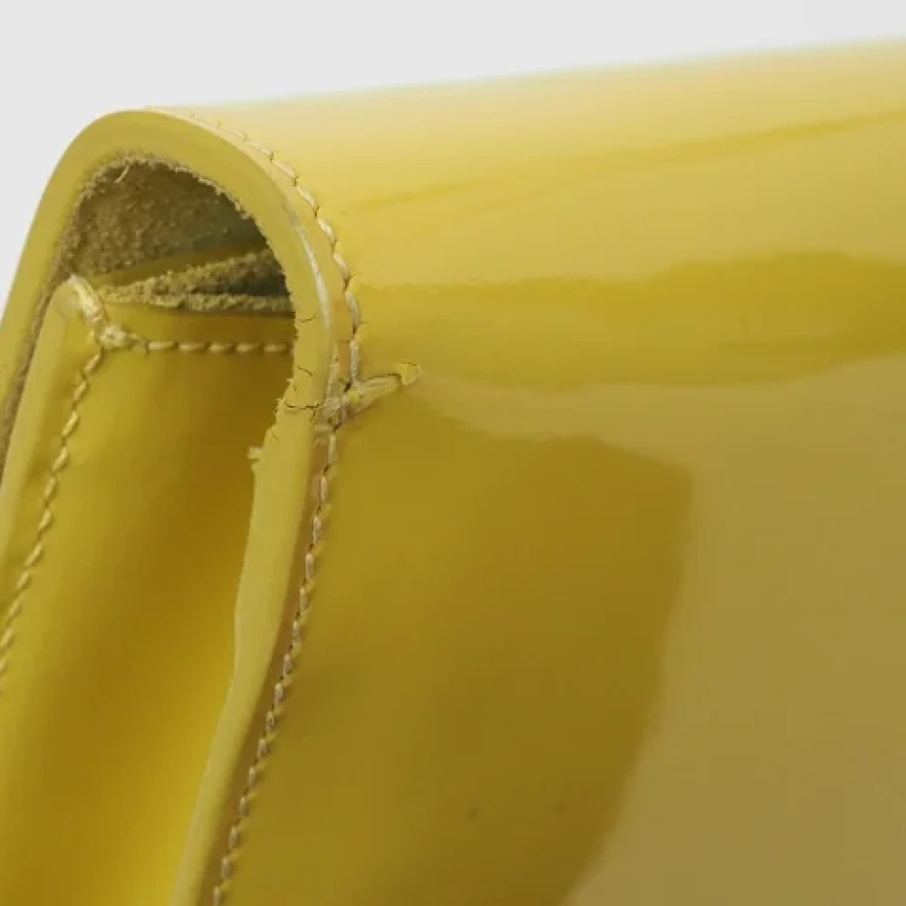 Yves Saint Laurent Vintage Pre-owned Leather clutches Yellow Dames