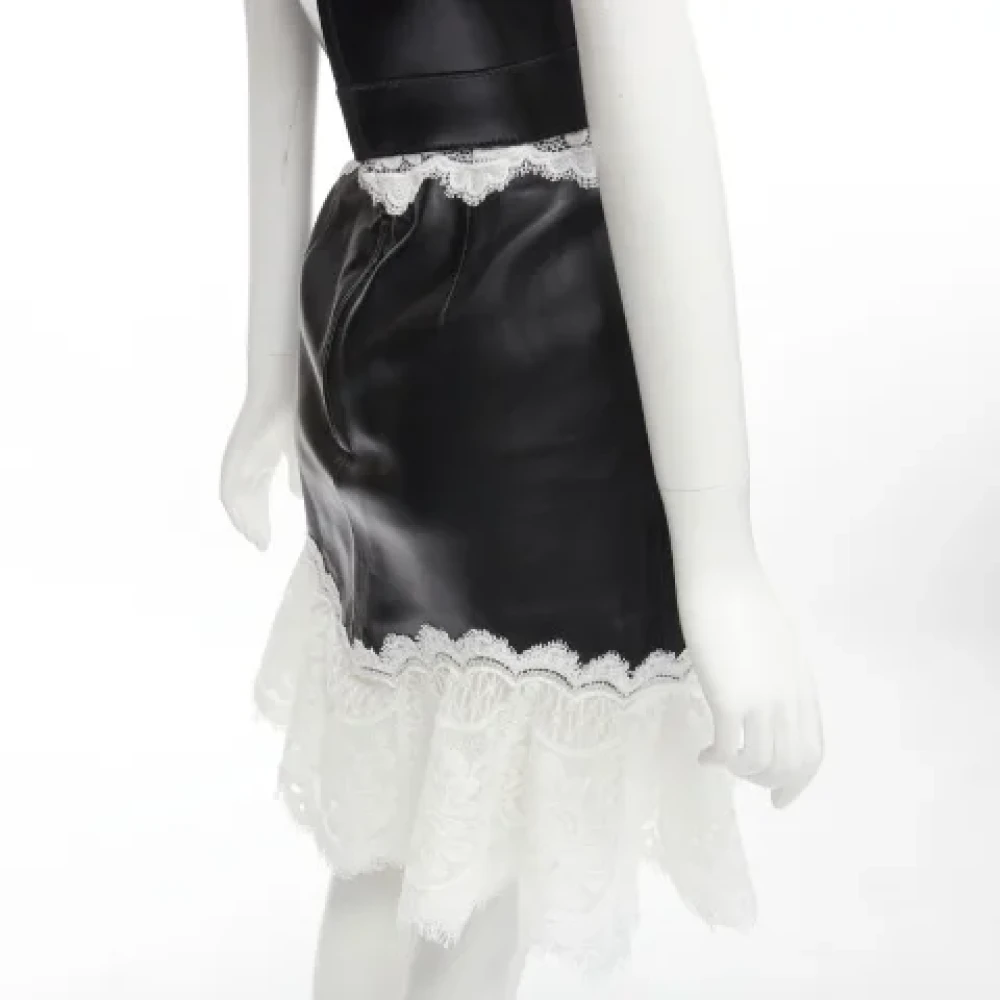 Alexander McQueen Pre-owned Leather dresses Black Dames