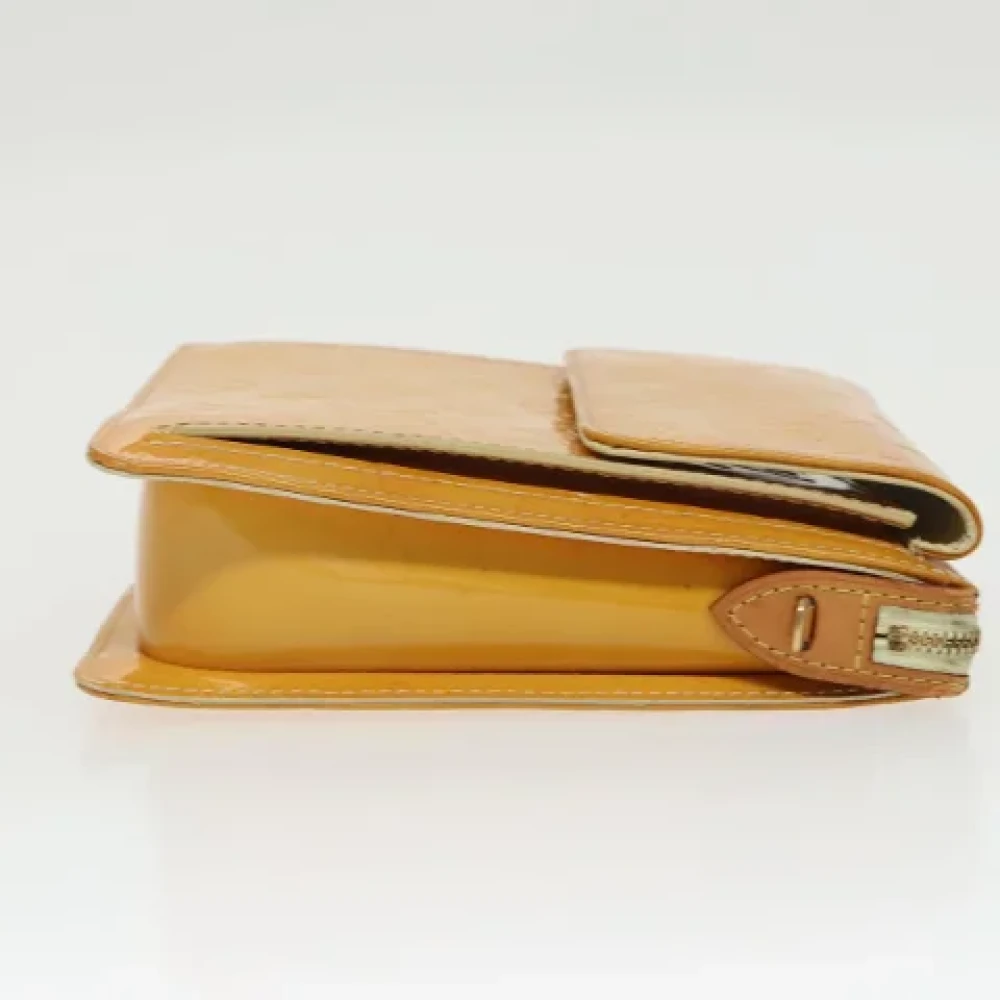 Louis Vuitton Vintage Pre-owned Leather clutches Yellow Dames