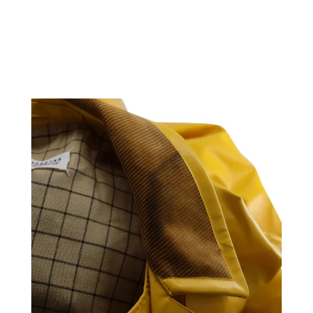 Maison Margiela Pre-owned Plastic outerwear Yellow Dames