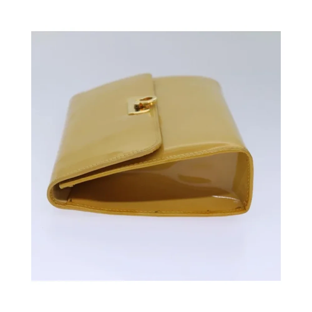 Salvatore Ferragamo Pre-owned Fabric pouches Yellow Dames