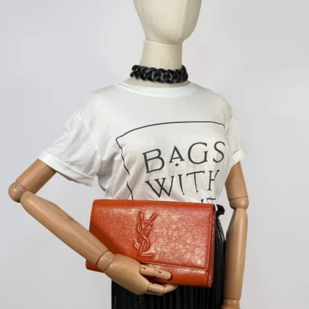 Yves Saint Laurent Vintage Pre-owned Leather clutches Orange Dames