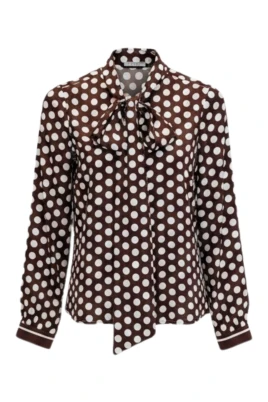 Blus med rosett