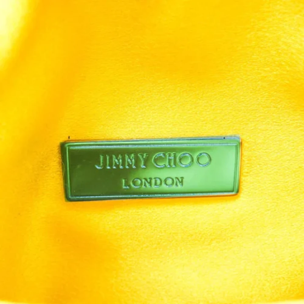 Jimmy Choo Pre-owned Satin clutches Yellow Dames